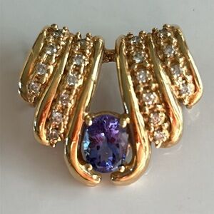 Tanzanite and diamond pendant slide.